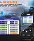 Ford Lincoln Mercury All Systems OBD2 Scanner displaying I/M readiness test results on screen against diagnostic background.