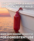 Complete Boat Fender Package With Four Red 8.5 Inch By 27 Inch Bumpers on a boat at sunset.