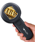 Handheld Digital Microscope With 2 Inch LCD Screen, 100X Coin Magnifier and Jewelry Loupe, Lighted Trichome Magnifying Glass, Handy Pocket Friendly and Portable for Collectors, Easy Share Live View for Coins, Gems, Jewelry, and Error Coins. Handheld black plastic loupe magnifying a gold coin close-up.