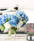 Mudder Silver Rotating Display Turntable Base For Epoxy Tumbler with floral arrangement, 360 Degree Electric Spinner shown.