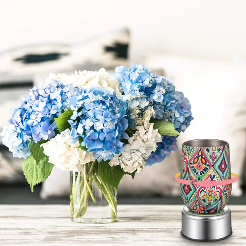 Mudder Silver Rotating Display Turntable Base For Epoxy Tumbler with floral arrangement, 360 Degree Electric Spinner shown.