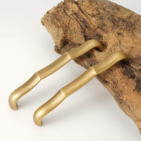 Solid Brass Cabinet Pulls 5 Pack, 5 Inch Hole Center Drawer Handles, Premium Hardware, modern classic design, laid on wood