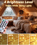 Lit 165Ft Ultra Long Copper Wire String Lights with 500 LEDs displayed in a cozy bedroom setup with remote control showing 4 brightness levels.