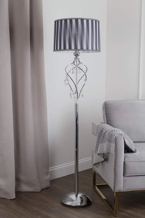 63 Inch Lady Crystal Floor Lamp With Twisted Metal Frame And Hanging Crystals, Black And White Shade next to sofa