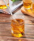 2 Pack Alcohol Hydrometers 0-200 Proof And 0-100 Tralle Alcohol Proof Gauges For Moonshine Still, Home Brew, Wine Making, Distilling, Easy Float And Readout For Accurate Alcohol Content. Hydrometer in glass of amber spirit