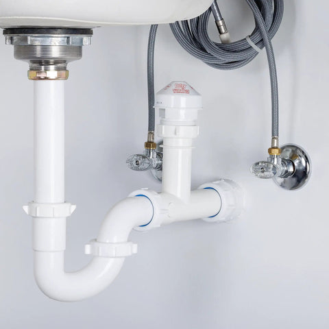Workhorse 8 DFU Capacity Air Admittance Valve Installation Kit for DWV Systems under sink showing white P-trap and AAV