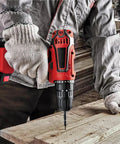 Compact 21V Cordless Drill Kit Featherweight Power Driver in action, driving a screw into wood, showcasing ergonomic grip.