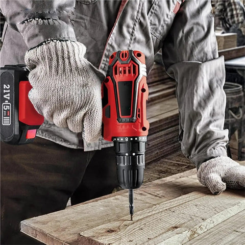 Compact 21V Cordless Drill Kit Featherweight Power Driver in action, driving a screw into wood, showcasing ergonomic grip.