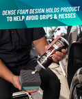Applying tire dressing with Wonder Wave Durafoam Tire Shine Applicator Pads With Contour Wave Design on large SUV tire