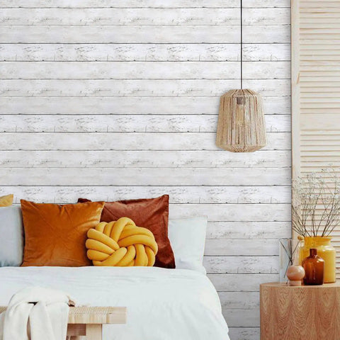Room scene with Shiplap Peel And Stick Wallpaper White Wood Plank Vinyl Wrap for walls behind a bed and nightstand, DIY friendly