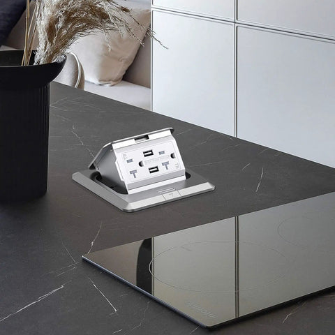Pop Up Floor Outlet Box With USB Charging, 4.8A Quick Charge, Waterproof Stainless Steel Receptacle, Hidden Flush Mount, Silver on counter