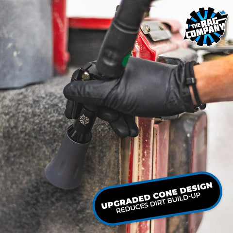 Ultra Air Blaster Mini Car Detailing Tool in use on car carpet with upgraded cone design for reducing dirt build-up