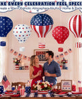 Five Pack 12 Inch Patriotic Hot Air Balloon Paper Lanterns For 4th Of July Indoor Outdoor Party Decor With Stars And Stripes Navy Star Field And Old Glory Designs hanging above a festive table setting.