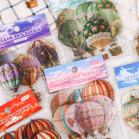 120 Colorful Hot Air Balloon PET Stickers Set for Scrapbooking and Journaling, Waterproof DIY Craft Decor displayed in packaging.