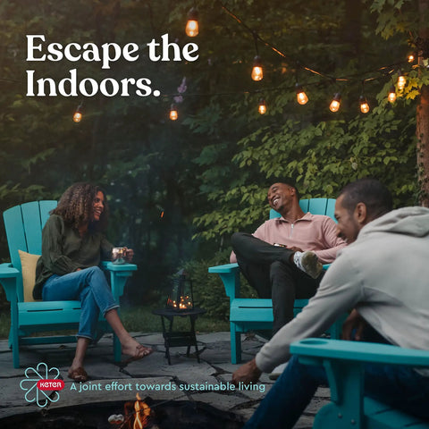 Group of friends enjoying an outdoor evening with string lights and Adirondack chairs, showcasing outdoor living space.