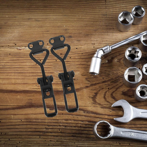 Heavy Duty Adjustable Toggle Latch Clamp With Quick Release Metal Pull Latch For Industrial Tool Boxes, Cabinets, And Workholding Fixtures, Compact, Spring Loaded, Beefy And Secure Clamp For Tough Jobs on wooden surface with tools