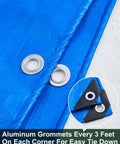 Close-up of blue tarp with aluminum grommets, part of 3 Pack 10 Foot By 10 Foot Heavy Duty Waterproof Tarps With Grommets 5.5 Mil Thick PE Ground Cover