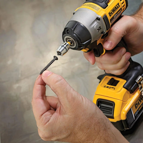 Person using an impact driver with FlexTorq Magnetic Bit Holder For Impact Tools, 2 Inch Length, Impact Ready Bits, 15 Degree Flex.