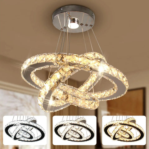 Dimmable LED Three-Ring Chandelier with Crystal Accents and Stainless Steel, adjustable modern ceiling fixture for living or bedroom.
