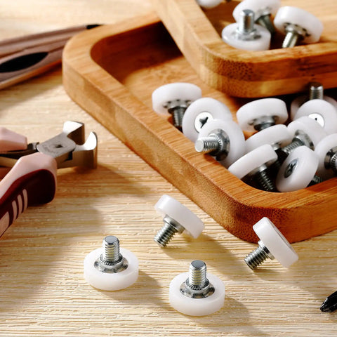 Game Changing 16 Piece 19 Mm Three Quarter Plastic Drawer Rollers With Precision Ball Bearing For Slick Cabinet Sliding And Kitchen Furniture Easy No Sweat Replacement in a wooden tray.
