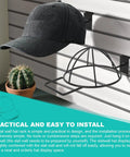6 Pack Slat Wall Hat Display Racks For Vendors And Retail Stores Go-To Pro Grade Heavy Duty Slat Wall Hat Racks For Baseball Caps Beanies And Wigs Durable Metal Organizer For Home Shop Or Market showing black cap on rack installed on slat wall.