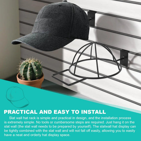 6 Pack Slat Wall Hat Display Racks For Vendors And Retail Stores Go-To Pro Grade Heavy Duty Slat Wall Hat Racks For Baseball Caps Beanies And Wigs Durable Metal Organizer For Home Shop Or Market showing black cap on rack installed on slat wall.