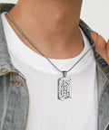 Person wearing Steampunk Gear Dog Tag Necklace With Rotating Mechanical Pendant In Stainless Steel on denim jacket and T-shirt
