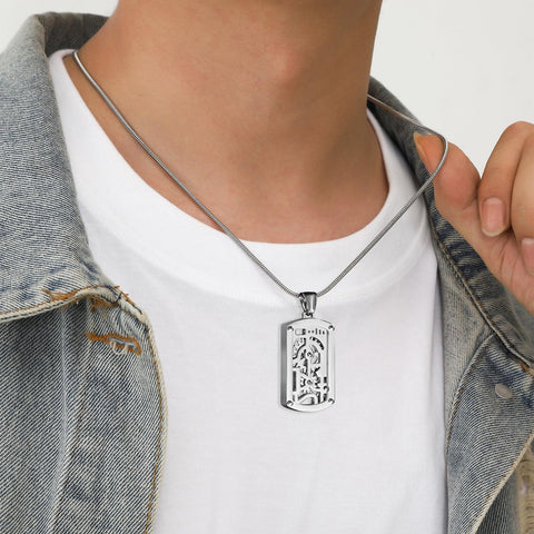 Person wearing Steampunk Gear Dog Tag Necklace With Rotating Mechanical Pendant In Stainless Steel on denim jacket and T-shirt