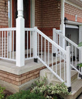 Front porch with white railings secured by 4x4 Wood Fence Post Anchor Base, 13 Gauge Steel, Black Powder Coated, Heavy Duty Post Support
