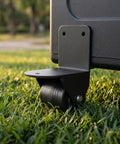 Two Pack Black Right Angle Fixed Casters With L Bracket Plates Non Swivel Rubber Wheels bringing slick rolling under a heavy appliance.