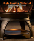 Close-up of chiminea outdoor fireplace wood burning fire pit for backyard and camping in brown black finish with mesh screen