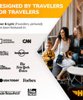 Family sitting on sofa, featured in National Geographic, CNN, The Guardian, New York Times, surrounded by travel magazines.