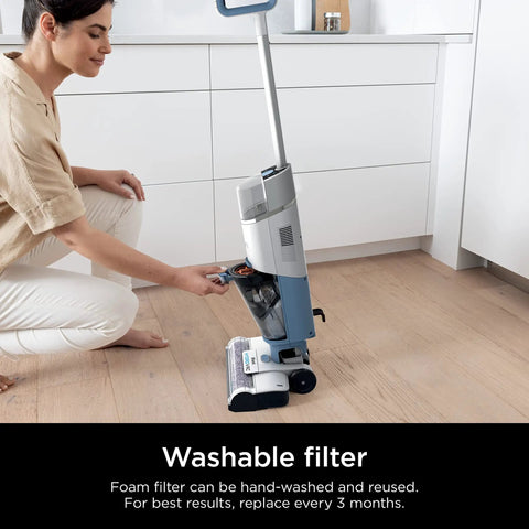 Woman inserting filter into HydroVac Antimicrobial Brushroll And Two Pack Filter Bundle No Fuss For All HydroVac Three In One.