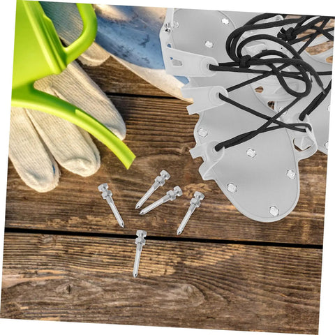 Heavy Duty Metal Turf Spikes Aerator Shoes For Lawn Care with pegs, gloves, and can, 20 piece set on wooden surface