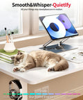 Electric Standing Desk With Adjustable Height And Memory Presets Heavy Duty Steel Base Rolling Casters For Office Gaming Home Setup 48X24 Inches White with a sleeping cat on it.