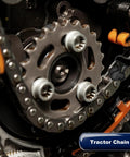 Close-up of a tractor chain and sprocket lubricated with Heavy Duty Moly Grease With Five Percent Molybdenum Disulfide