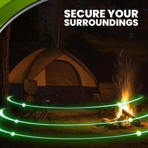 Night camping scene with tent and campfire secured by 12 Gauge Perimeter Alarm Adapter For Nailgun Blank Fire 22 Caliber Blanks