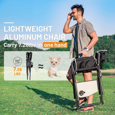 Man carrying Ultra Lite Aluminum Oversized Camping Chair With Side Table And Detachable Pocket outdoors, weighs 7.28 lbs