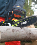 Hella Smooth 18V Brushless Battery Chainsaw With 30Cm Oregon Bar cutting through a log with tool-less tensioning in action.