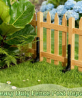 Wooden fence with installed Heavy Duty Fence Post Repair Kit 2 Pack With 32 Inch Anchor Stakes And Galvanized Screws