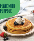 Pancakes with whipped cream and blueberries on Heavy Duty 9 Inch Compostable Paper Plates 125 Pack Made From Sugarcane Bagasse Biodegradable