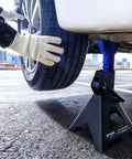ANTPOWER 3-Ton jack stand with blue adjustable post and black base supporting a car tire