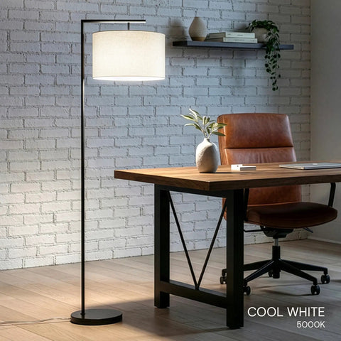 Modern LED Floor Lamp With Tan Fabric Shade Tall Corner Pole Standing Light For Living Rooms And Offices Ideal Bedroom Reading Light Black Finish That Fits Contemporary Home Decor And Brings A Bright Warm Vibe To Any Space in home office setting, displaying cool white illumination.