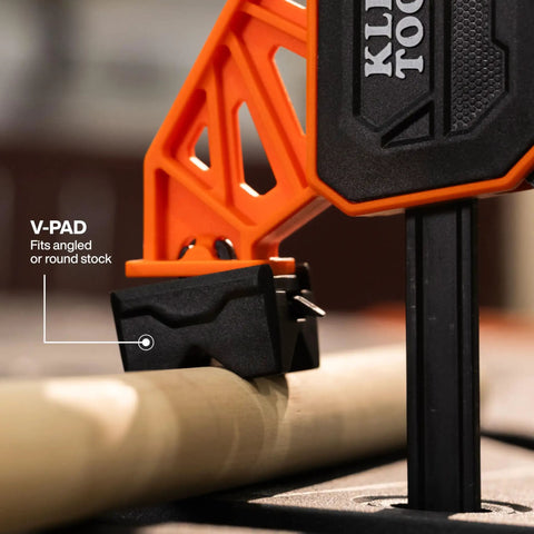 Close-up of Speed-Klamp 12 Inch Bar Clamp Set, V-pad fits angled or round stock, showcasing quick secure grip feature.