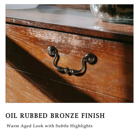 Oil Rubbed Bronze Drop Bail Drawer Pull 4 Pack on wooden dresser 4 inch center to center colonial style with traditional bead center