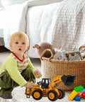 Toddler playing with Large Wheeled Loader Heavy Duty Construction Metal Bulldozer Toy For Kids Outdoor Sandbox Car Toys