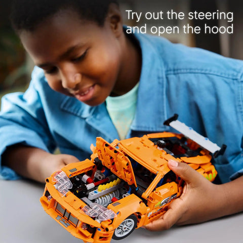 Child playing with Technic Fast and Furious Toyota Supra Mk4 Building Kit for Kids and Teens Ages 9 Plus Realistic Engine Details