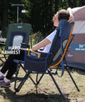 Oversized Folding High Back Lawn Chair for Adults With Cup Holder, Carrying Strap, Hard Armrests, 400Lb Capacity, Blue in use.