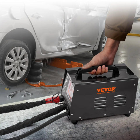 Spot Weld Dent Puller Kit With Two Weld Guns next to a dented car for auto body dent repair with 3KW stud welder and manual weld option