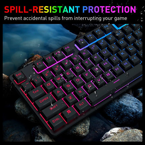 Dope Full Size Gaming Keyboard With Quick Turn Volume Knob, 104 Keys Wired PC Peripheral Featuring Fresh RGB Lighting And Crisp Feedback For Weekend Warriors on rocky surface with water droplets.